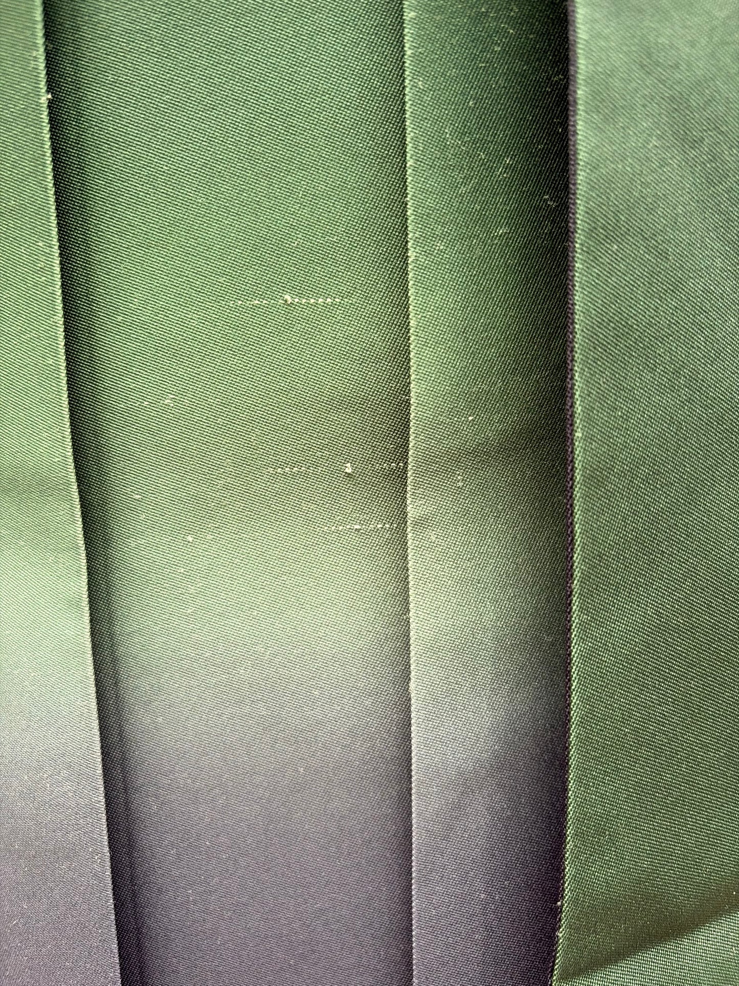 Close-up of the navy and green ombre fabric