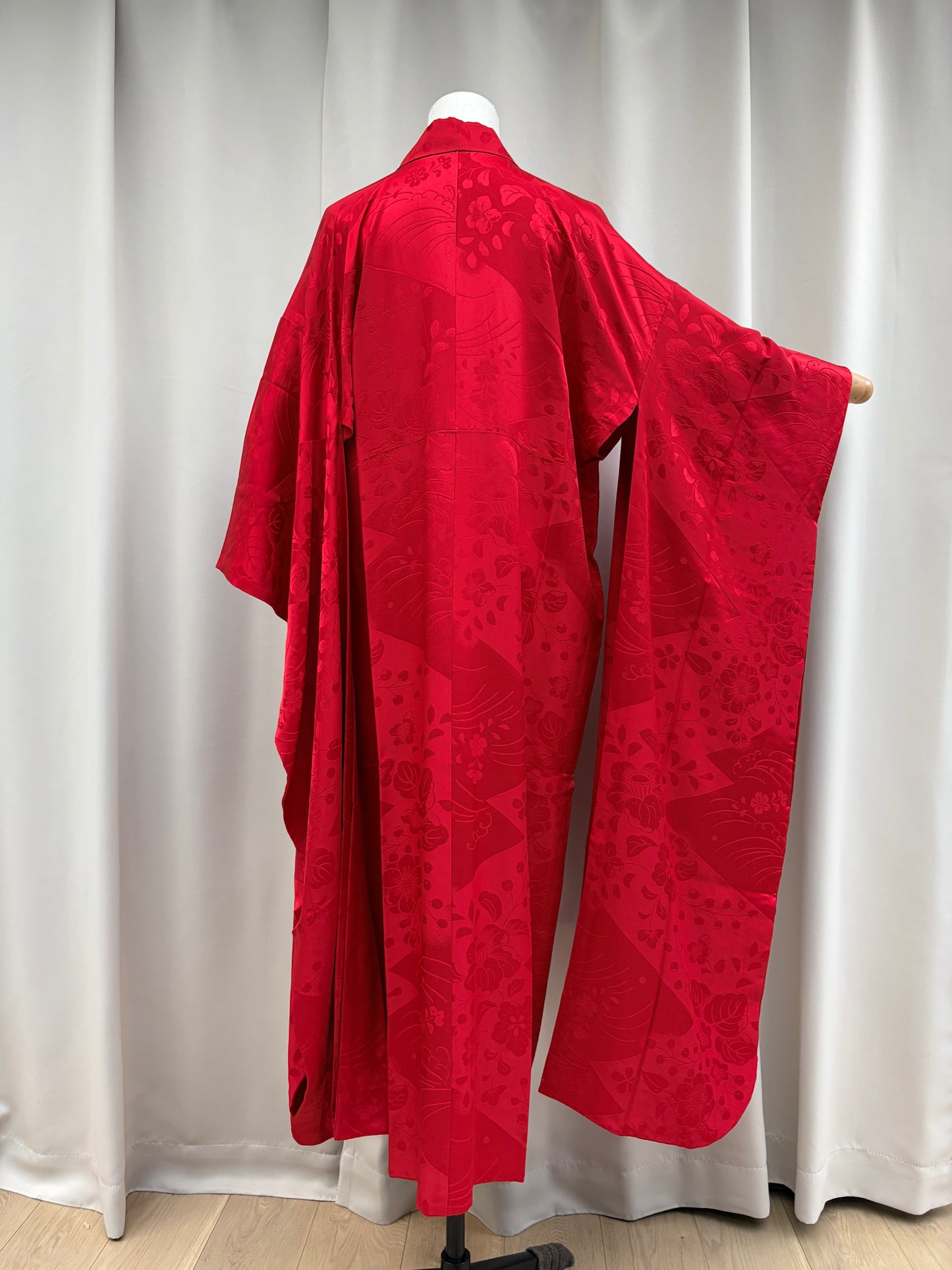 Vintage red nagajuban shown open to reveal the lining