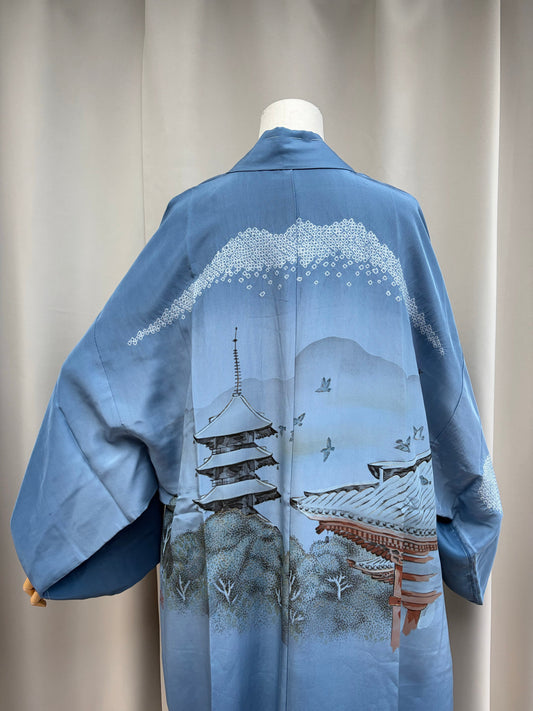 Hand-painted temple, pagoda and cranes landscape on the back of the blue nagajuban