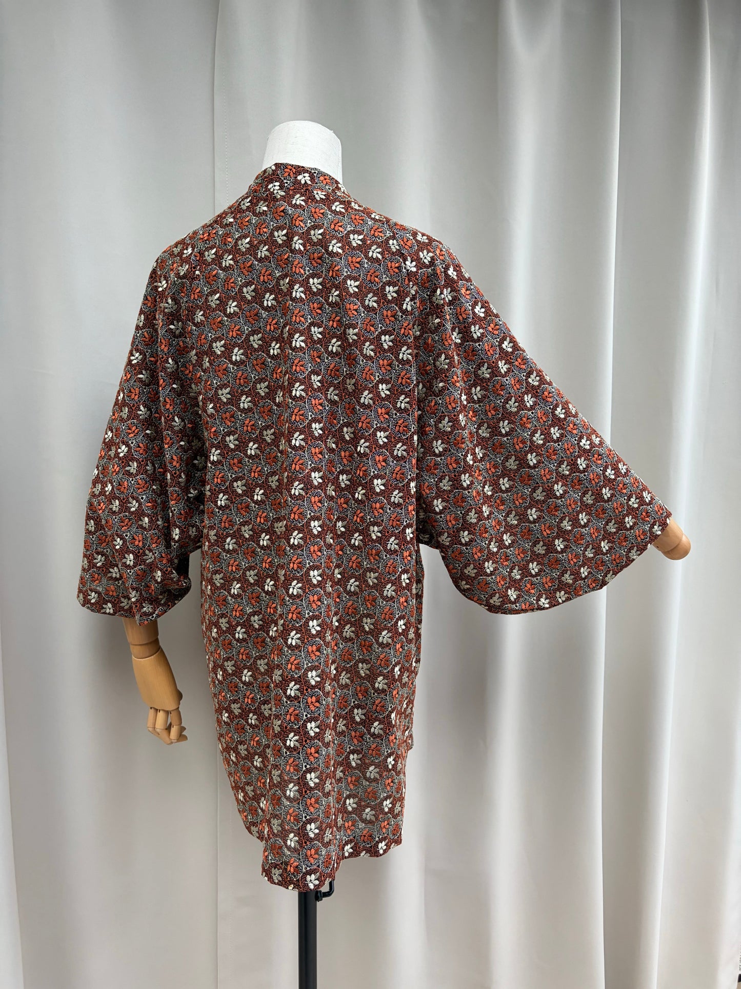 Full view of the sheer floral cutwork summer haori with round sleeves