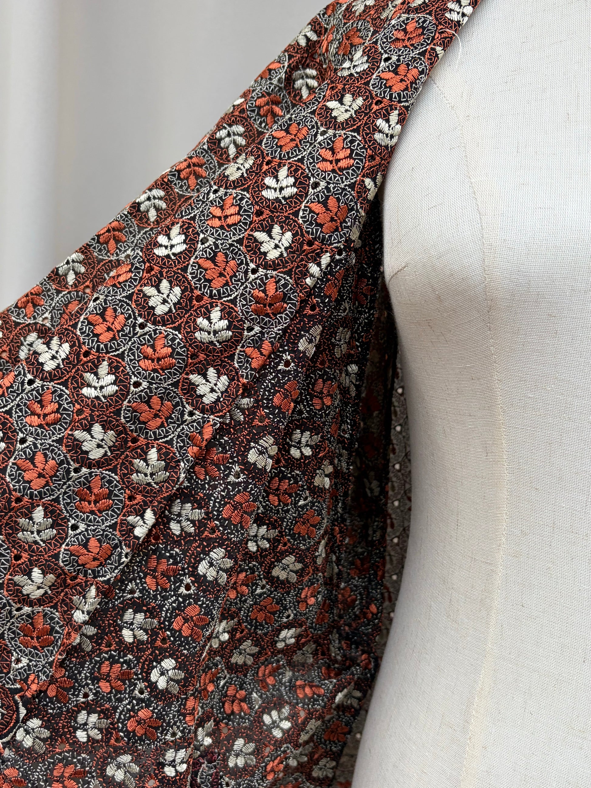 Collar and shoulder detail of the rust cutwork haori
