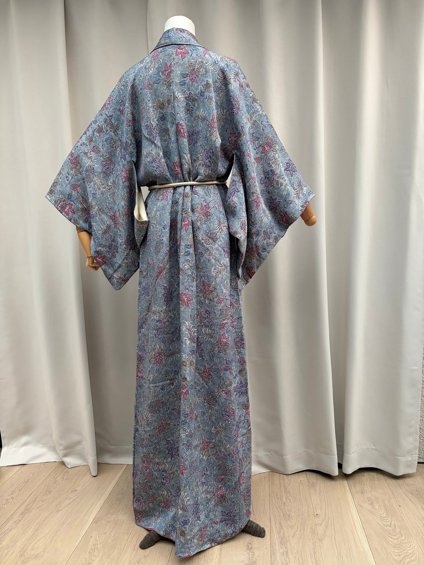 Front styling of the blue floral kimono worn as a wrap robe