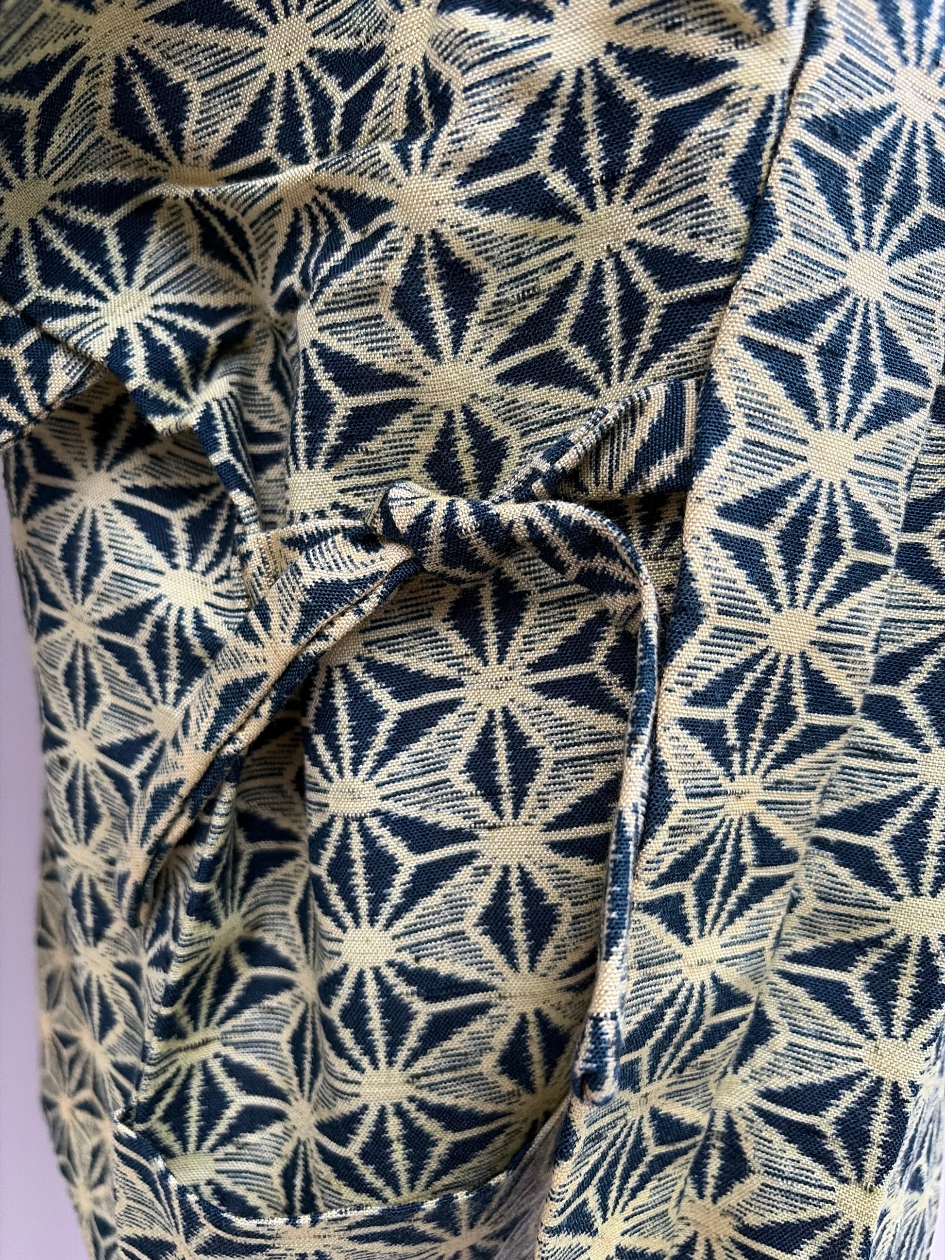 Collar and front tie detail of the asanoha hug-me haori
