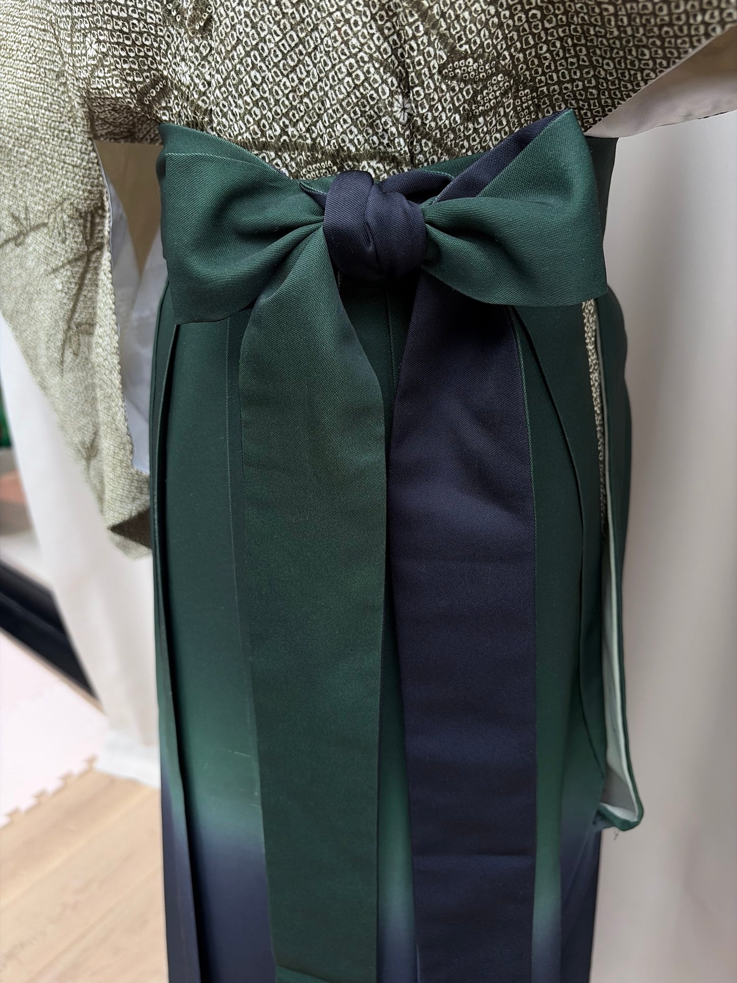 Full view of the navy to green ombre Japanese hakama