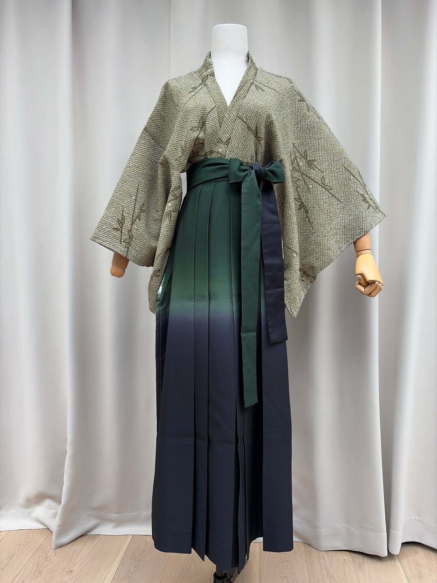 Crisp front pleats of the ombre hakama