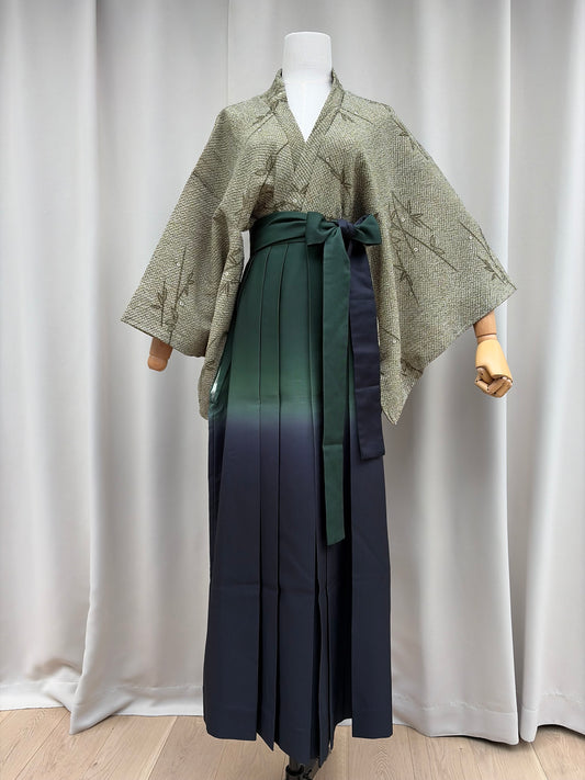 Crisp front pleats of the ombre hakama