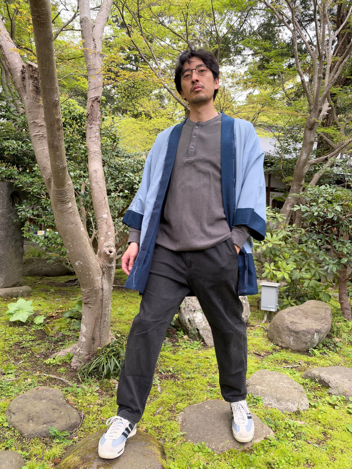 Navy haori worn open showing both the navy outer and blue lining