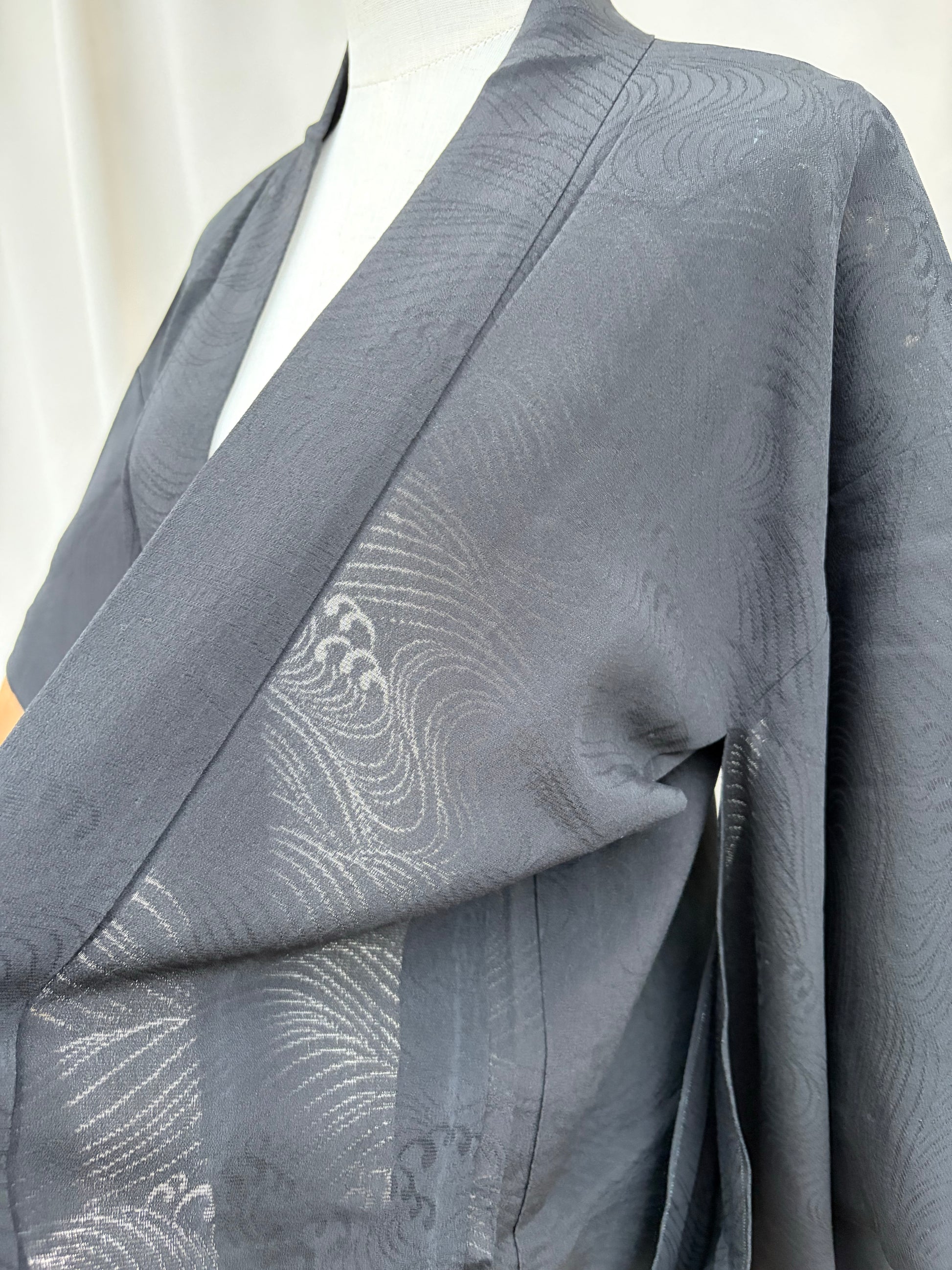 Close-up of the woven wave texture on the black summer haori