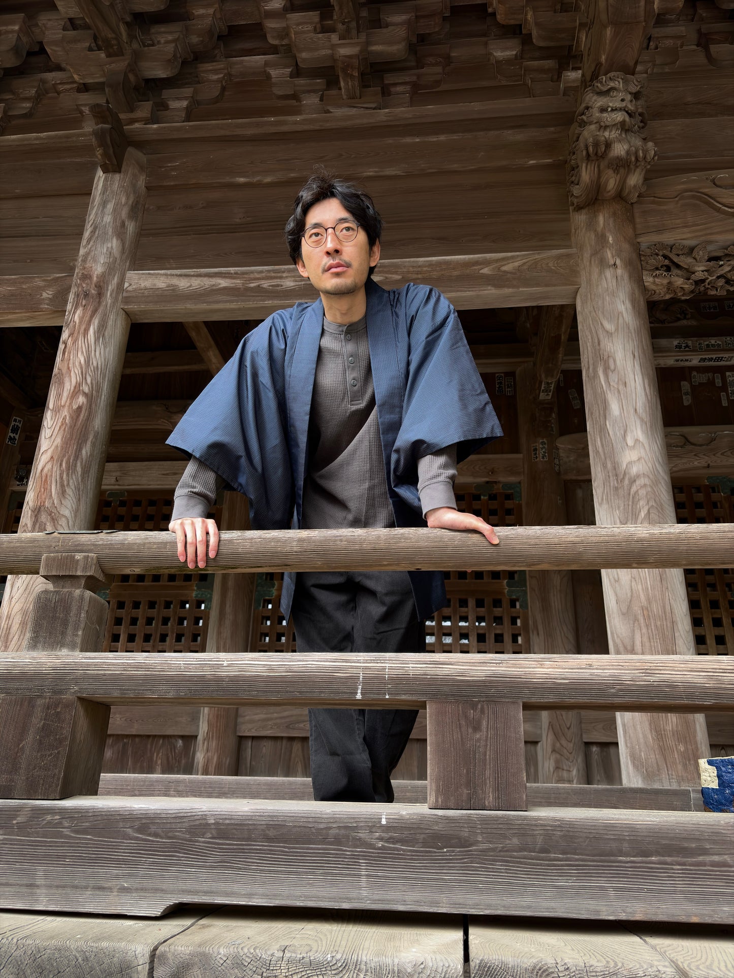 Model in the navy men's haori, side view
