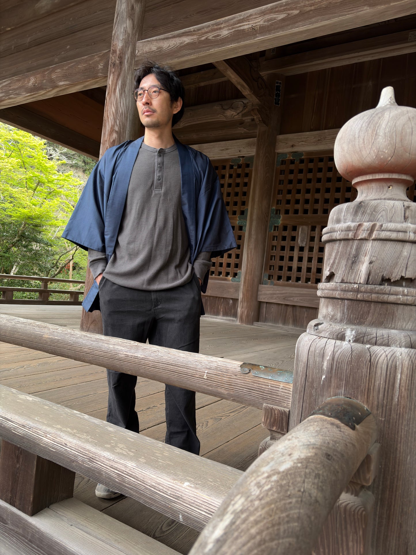 Back view of the navy men's haori revealing the golden dragon