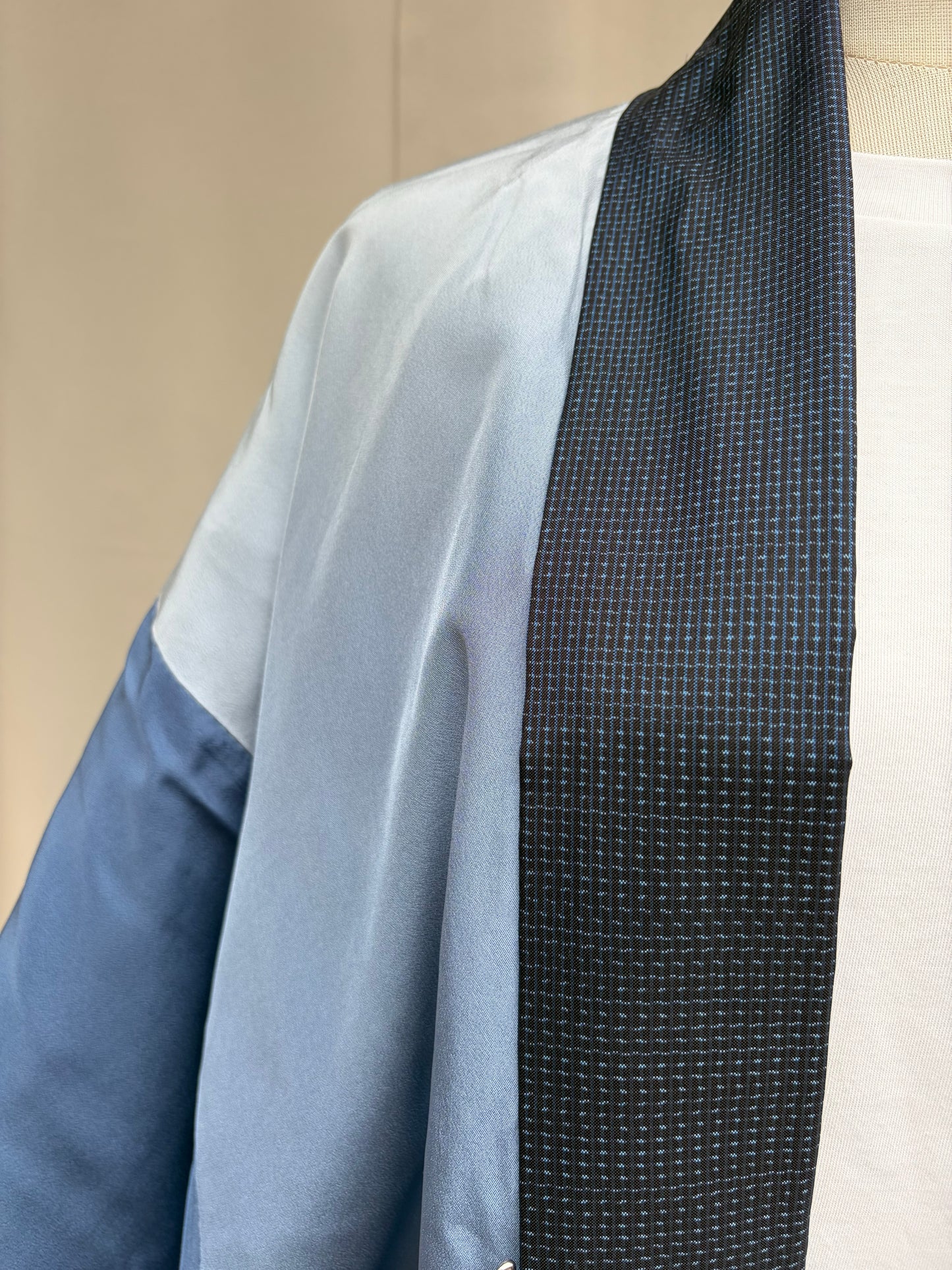 Navy men's haori front view on a stand