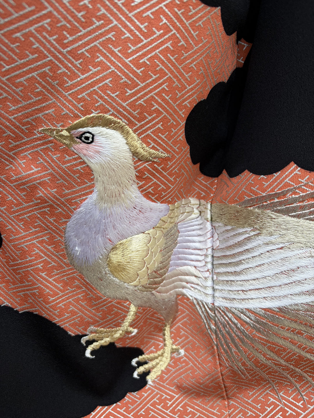 Detail of the pheasant embroidered in silver and gold