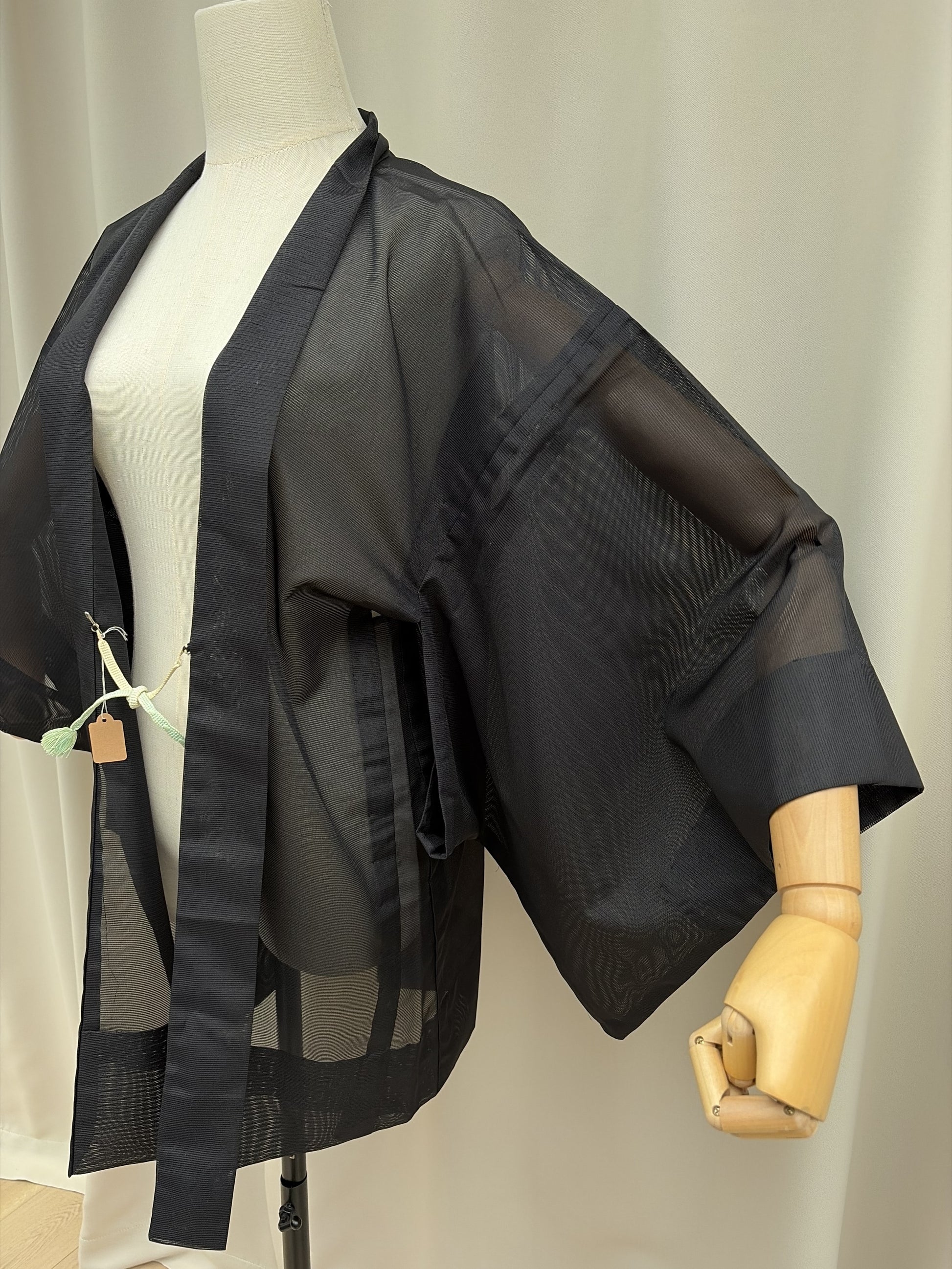 Side view of the black sheer summer haori kimono jacket