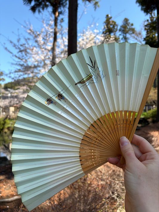 Vintage hand-painted Japanese paper fan with bamboo and two figures in a boat