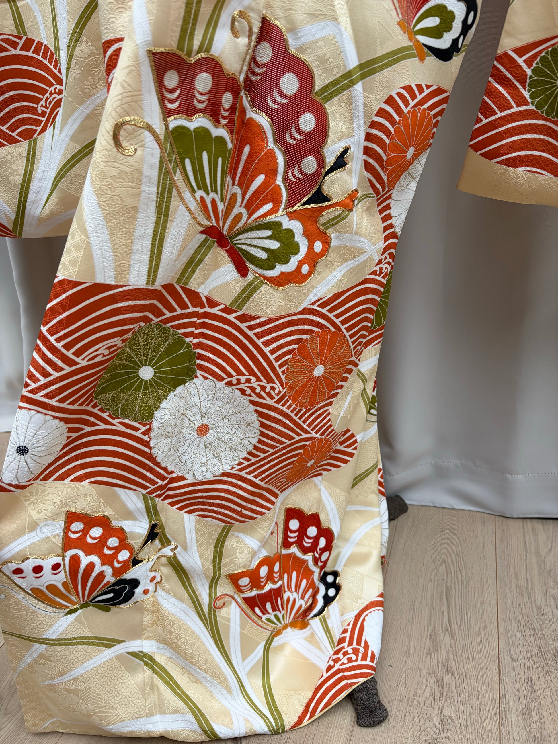 Gold embroidery detail on the furisode