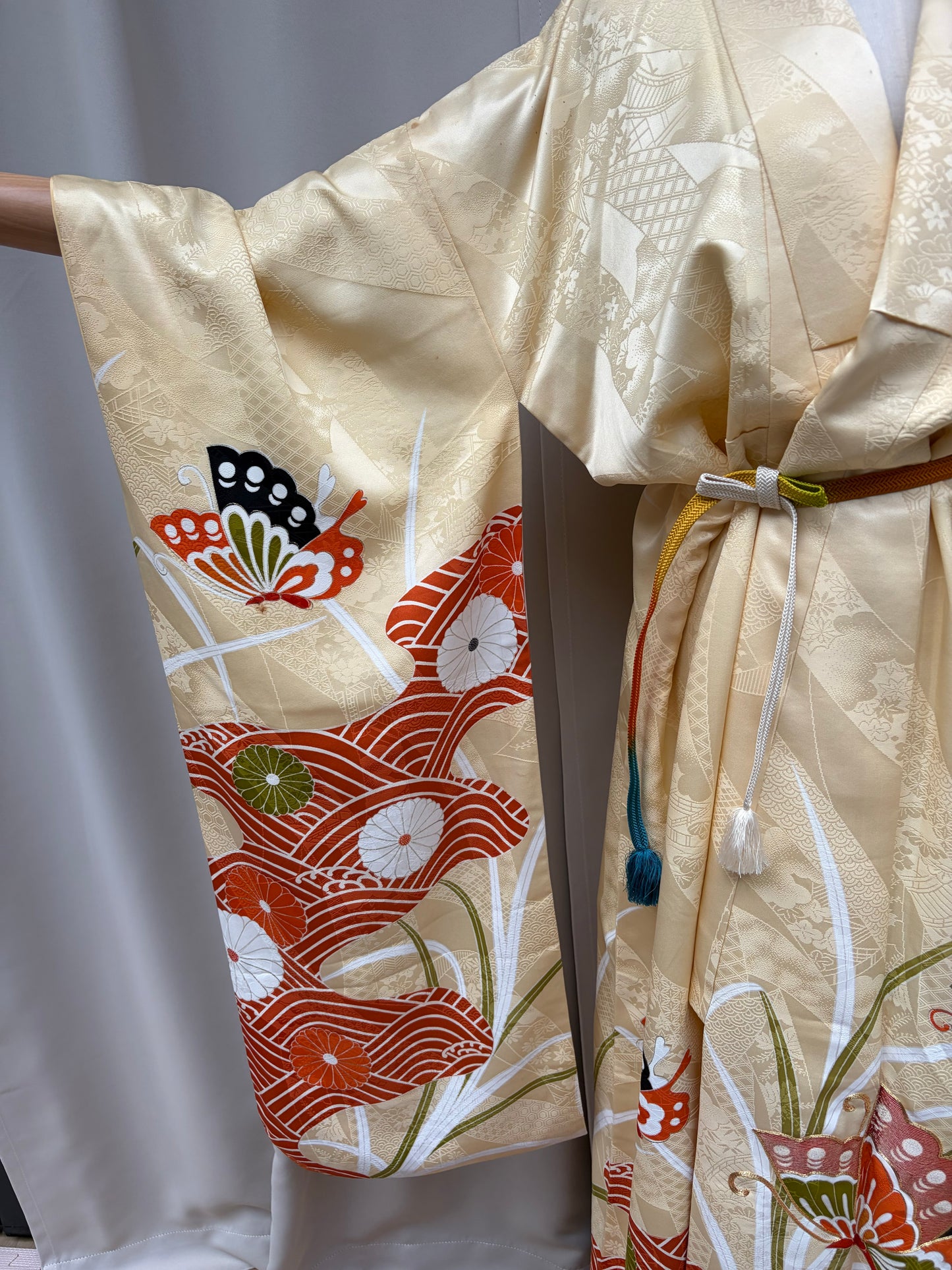 Full view of the cream yellow silk furisode