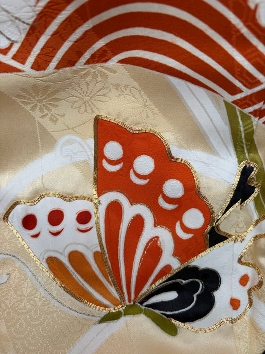 Gold embroidery detail on the furisode